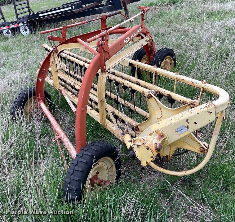 image for item LY9721 2000 Donahue EXG-150  swather / windrower trailer with hay rake