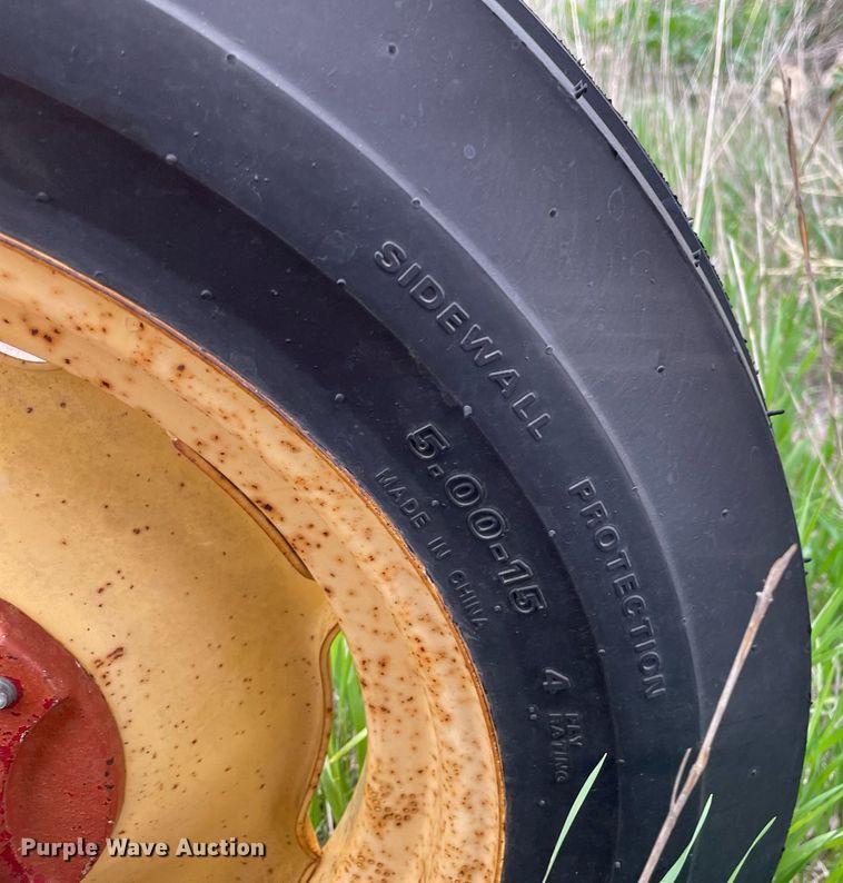 image for item LY9721 2000 Donahue EXG-150  swather / windrower trailer with hay rake