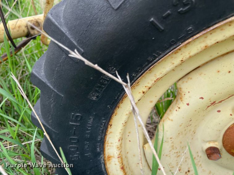 image for item LY9721 2000 Donahue EXG-150  swather / windrower trailer with hay rake