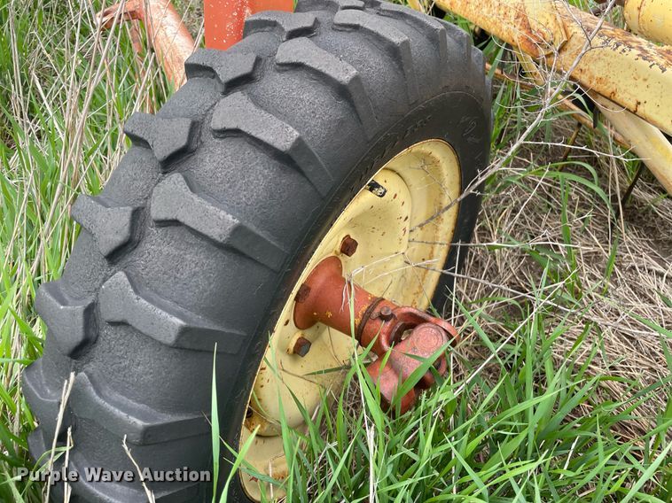 image for item LY9721 2000 Donahue EXG-150  swather / windrower trailer with hay rake