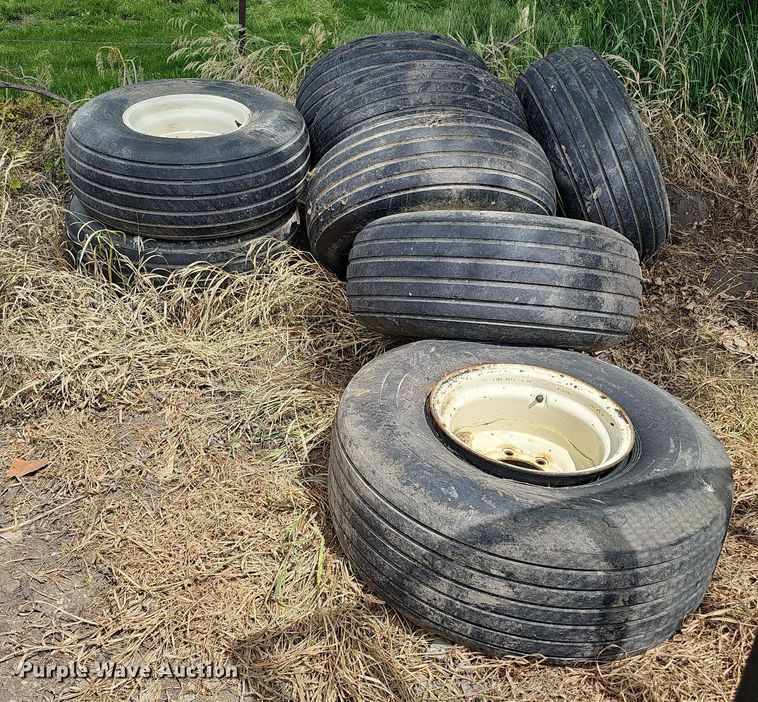 image for item MD9801 (8) 14L-16.1SL tires and wheels