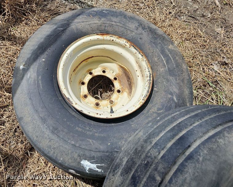 image for item MD9801 (8) 14L-16.1SL tires and wheels