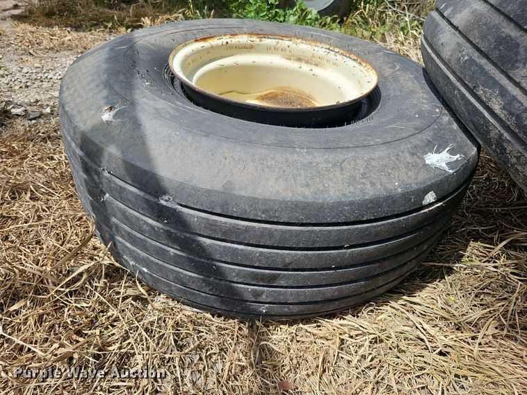 image for item MD9801 (8) 14L-16.1SL tires and wheels