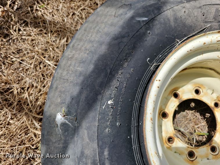 image for item MD9801 (8) 14L-16.1SL tires and wheels