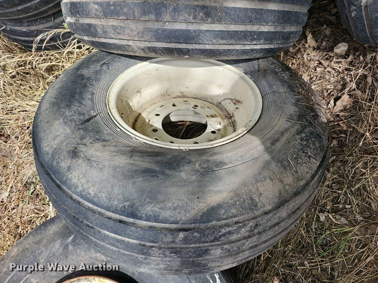 image for item MD9801 (8) 14L-16.1SL tires and wheels