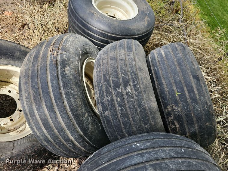 image for item MD9801 (8) 14L-16.1SL tires and wheels