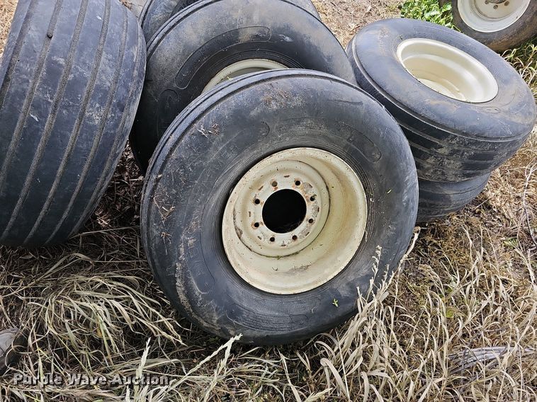 image for item MD9801 (8) 14L-16.1SL tires and wheels