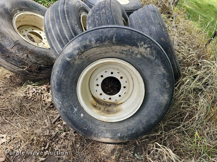 image for item MD9801 (8) 14L-16.1SL tires and wheels