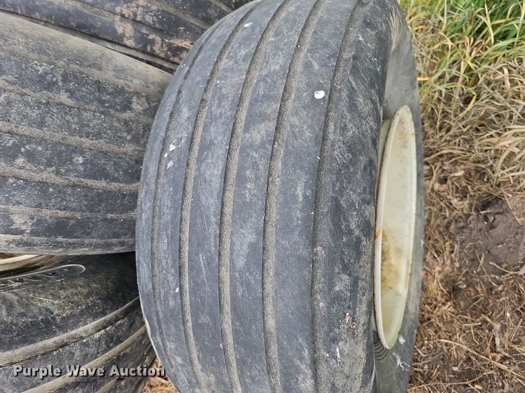 image for item MD9801 (8) 14L-16.1SL tires and wheels