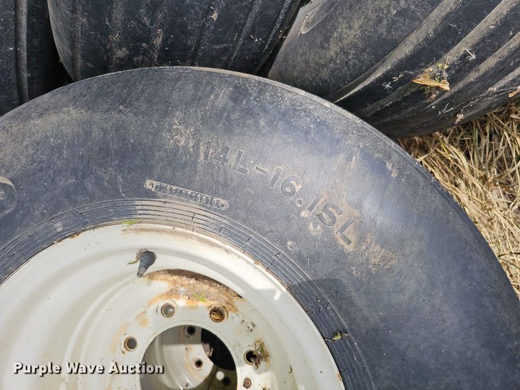 image for item MD9801 (8) 14L-16.1SL tires and wheels