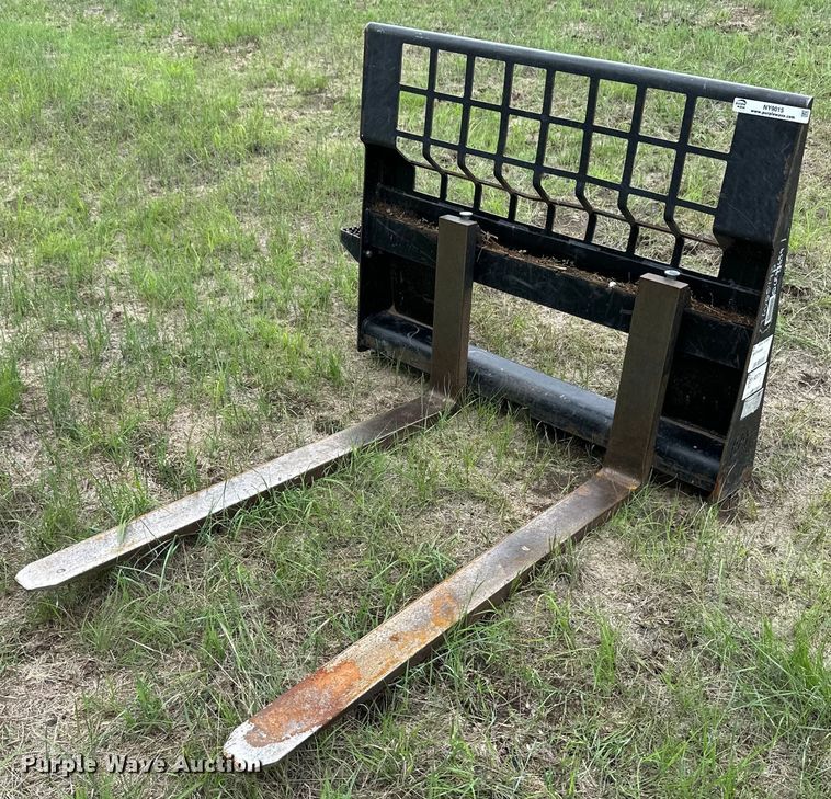 image for item NY9015 Caterpillar  skid steer forks