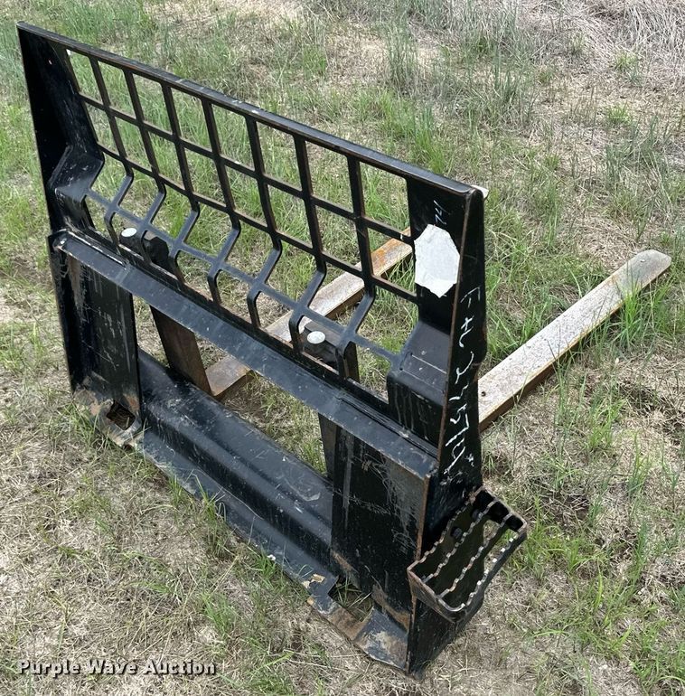 image for item NY9015 Caterpillar  skid steer forks