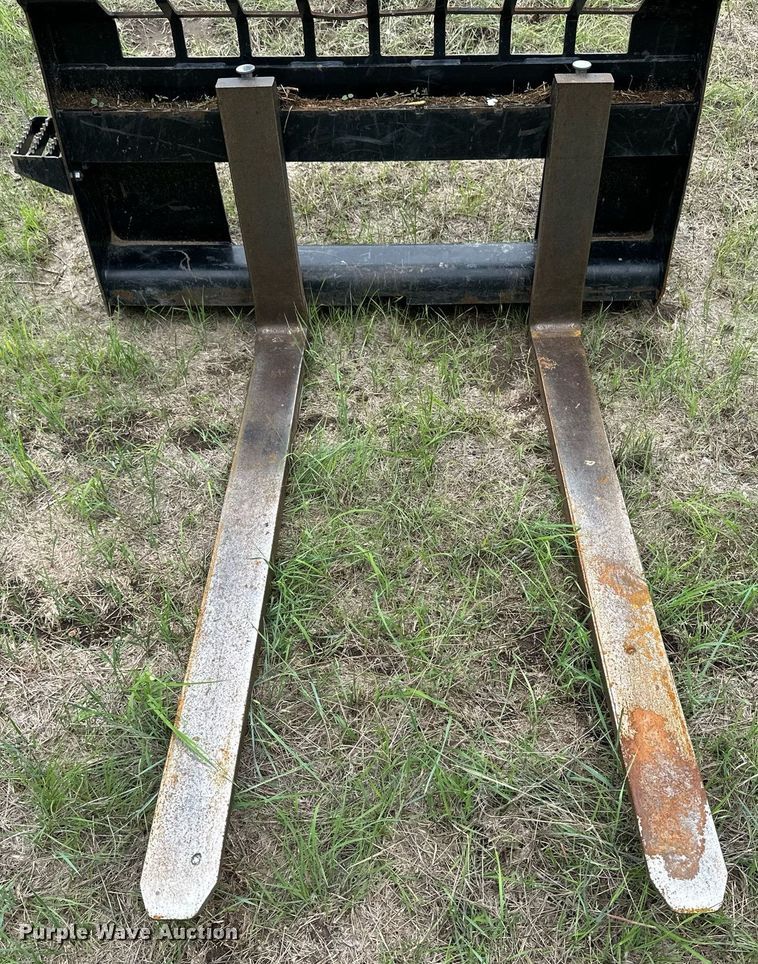 image for item NY9015 Caterpillar  skid steer forks