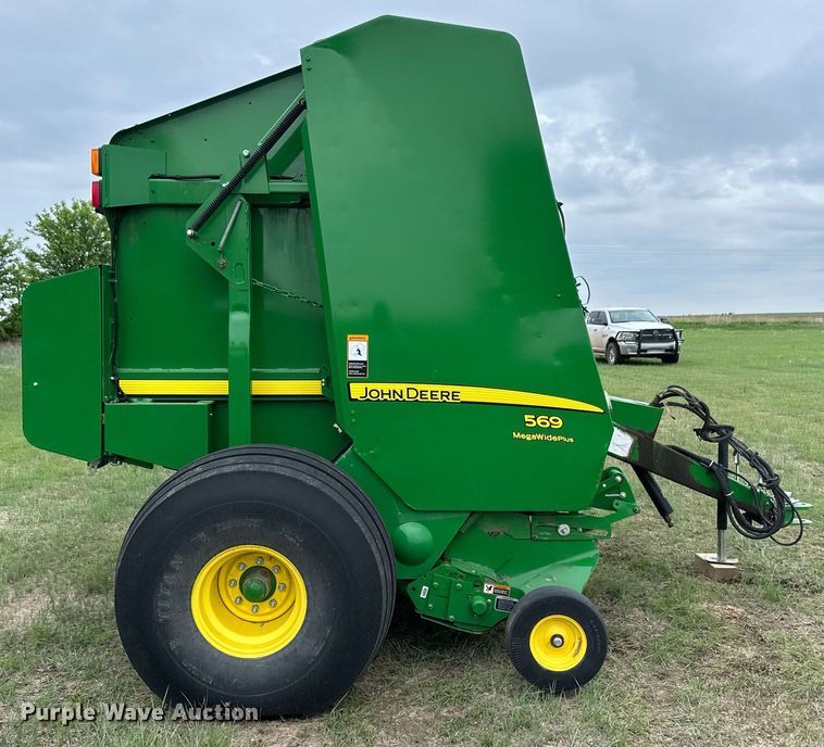 image for item NY9017 2017 John Deere 569 Mega Wide Plus  round baler