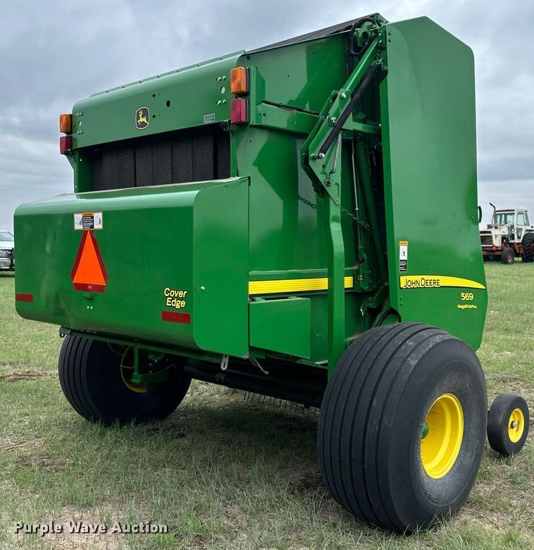 image for item NY9017 2017 John Deere 569 Mega Wide Plus  round baler