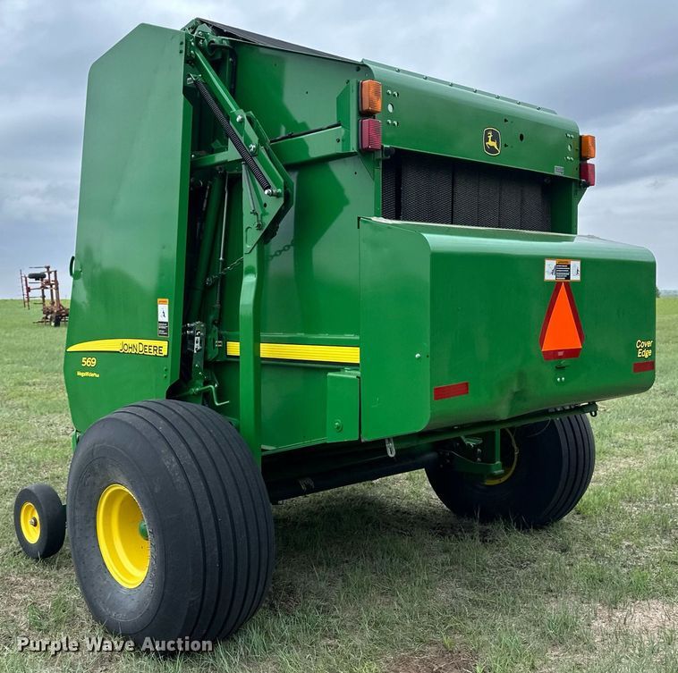 image for item NY9017 2017 John Deere 569 Mega Wide Plus  round baler