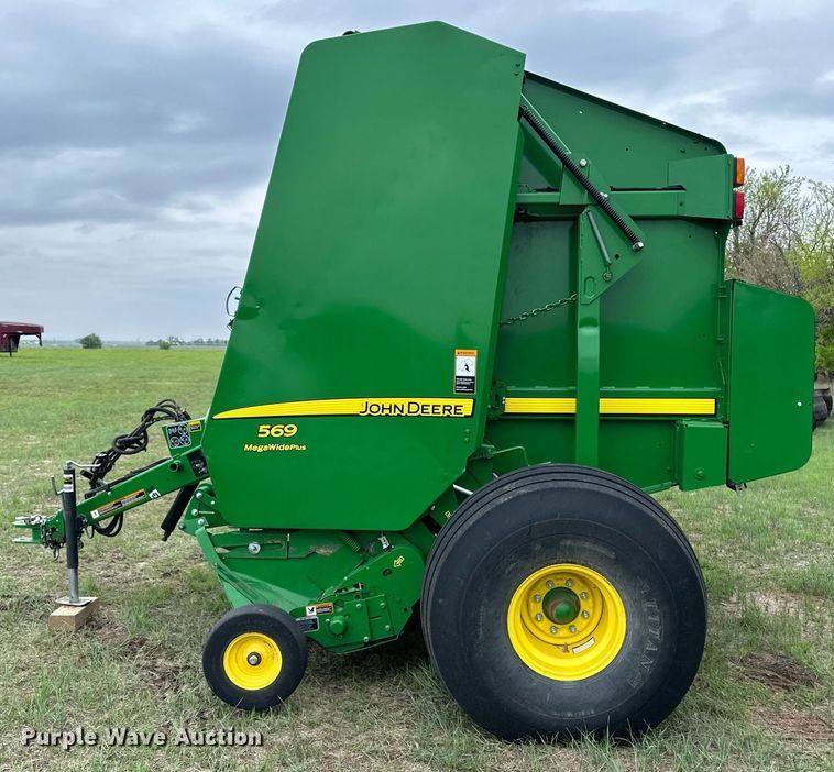image for item NY9017 2017 John Deere 569 Mega Wide Plus  round baler