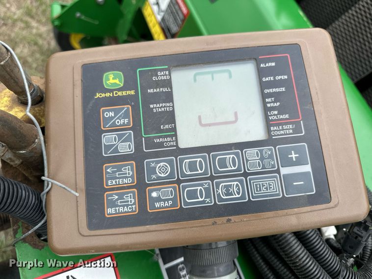 image for item NY9017 2017 John Deere 569 Mega Wide Plus  round baler