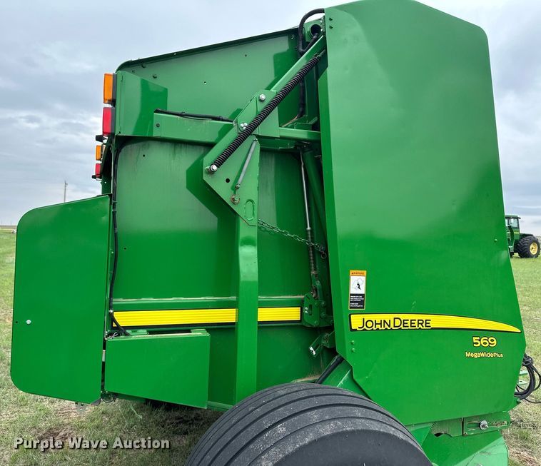 image for item NY9017 2017 John Deere 569 Mega Wide Plus  round baler