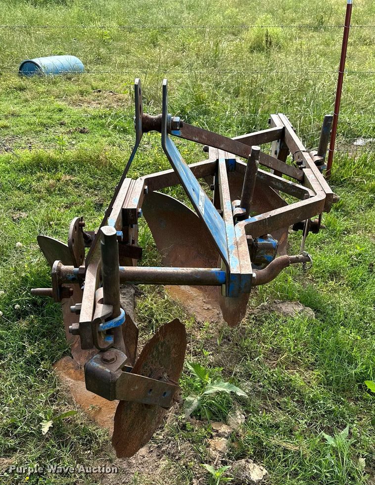 image for item OG9059 Ford  three bottom plow