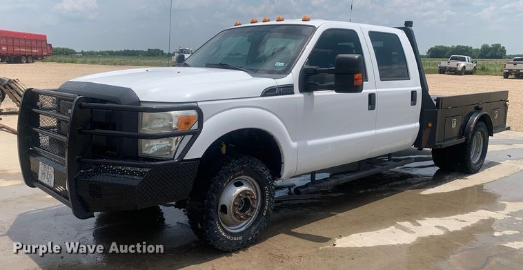 image for item DK7876 2015 Ford F350 Super Duty  Crew Cab flatbed pickup truck