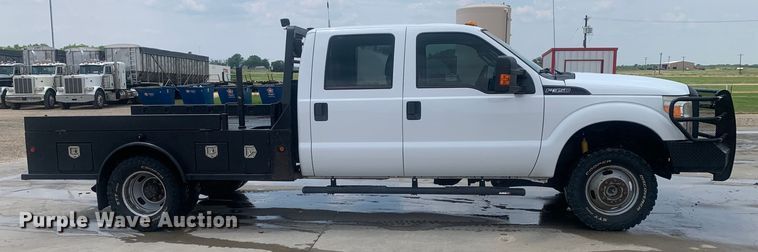 image for item DK7876 2015 Ford F350 Super Duty  Crew Cab flatbed pickup truck