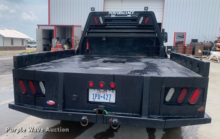 image for item DK7876 2015 Ford F350 Super Duty  Crew Cab flatbed pickup truck