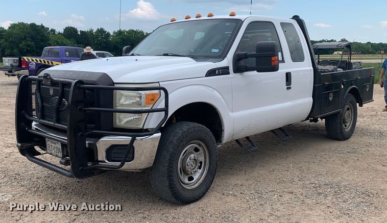 image for item DK7877 2011 Ford F350 Super Duty  SuperCab flatbed pickup truck