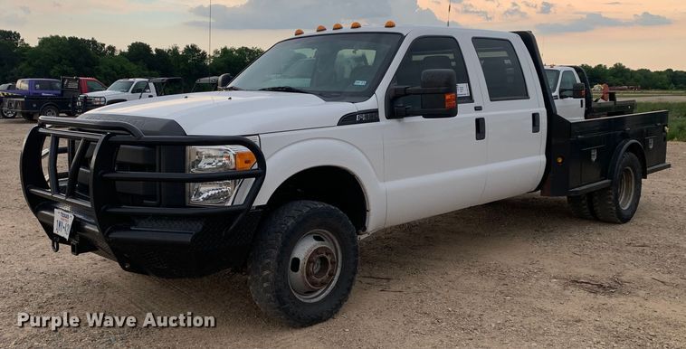 image for item DK7880 2014 Ford F350 Super Duty  Crew Cab flatbed pickup truck