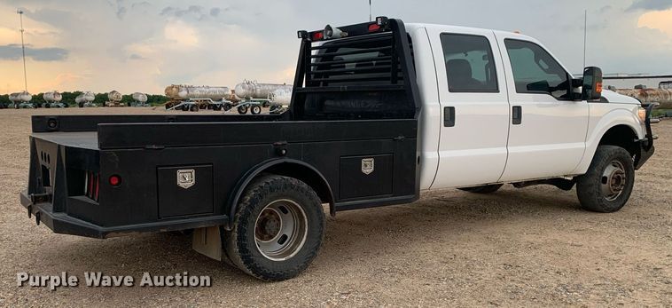 image for item DK7880 2014 Ford F350 Super Duty  Crew Cab flatbed pickup truck