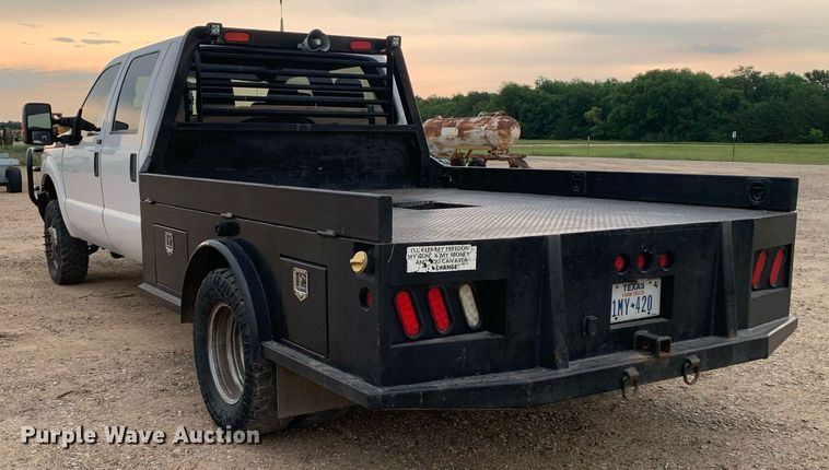 image for item DK7880 2014 Ford F350 Super Duty  Crew Cab flatbed pickup truck