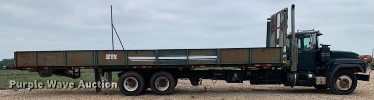 image for item DK7886 1998 Mack RD688S  cotton module transport truck