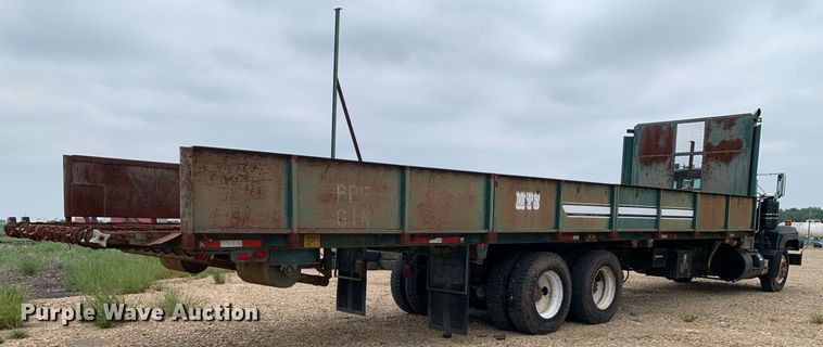 image for item DK7886 1998 Mack RD688S  cotton module transport truck