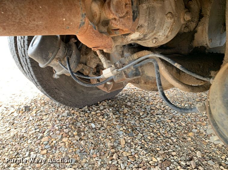 image for item DK7886 1998 Mack RD688S  cotton module transport truck