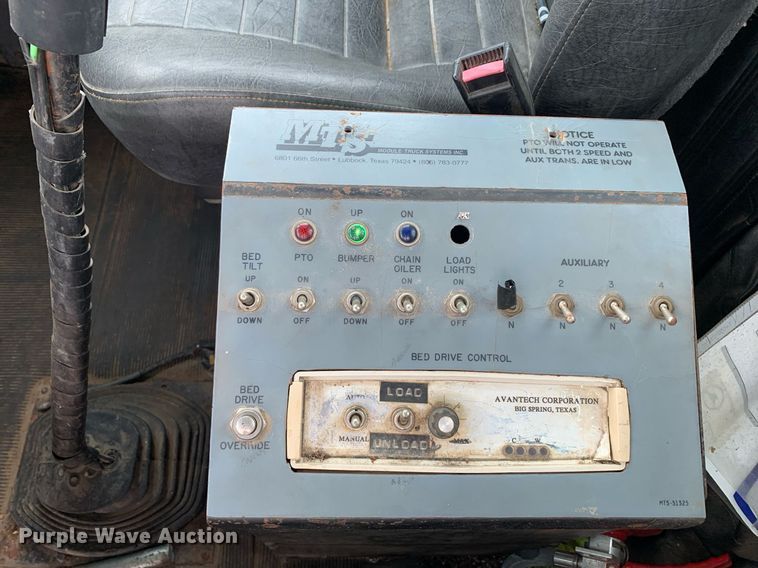 image for item DK7886 1998 Mack RD688S  cotton module transport truck