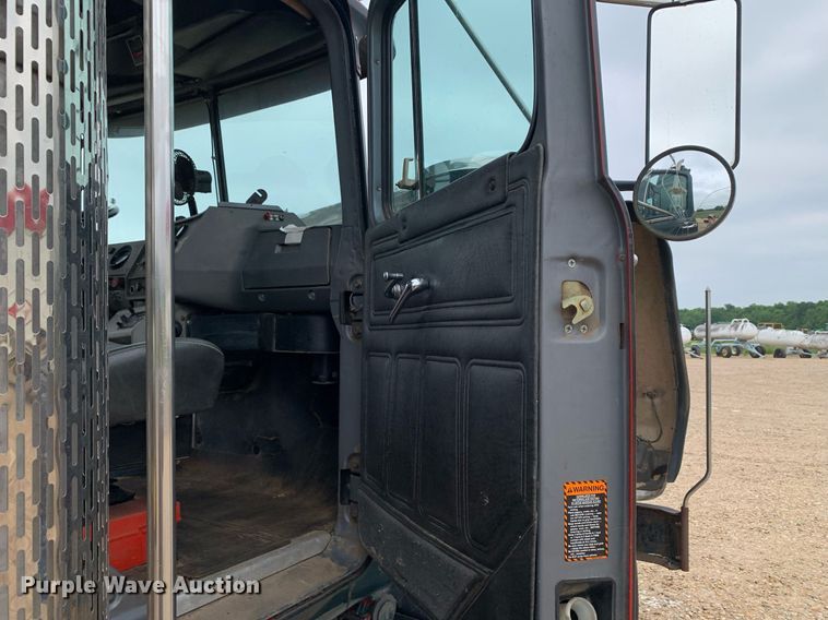 image for item DK7886 1998 Mack RD688S  cotton module transport truck