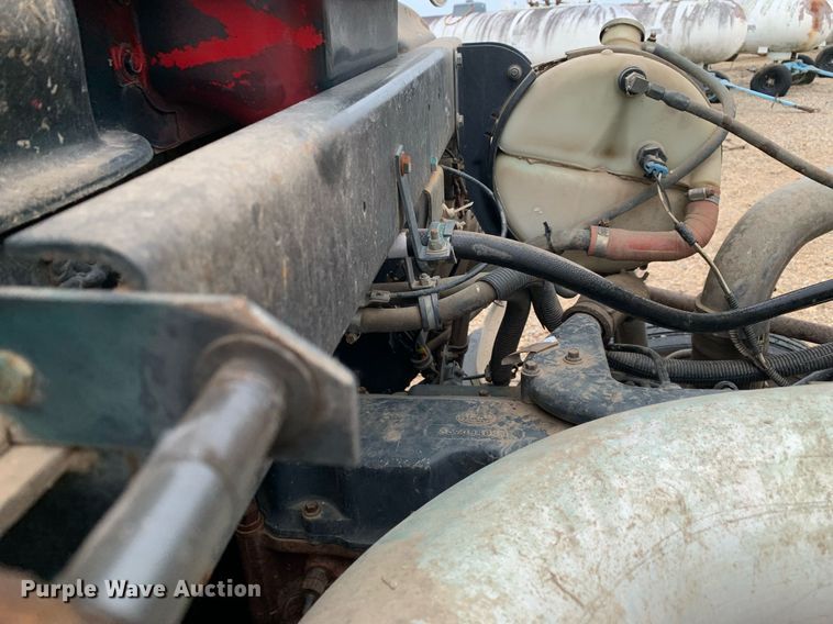 image for item DK7886 1998 Mack RD688S  cotton module transport truck