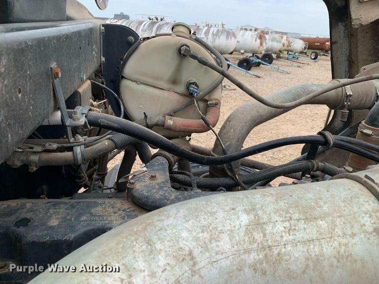 image for item DK7886 1998 Mack RD688S  cotton module transport truck