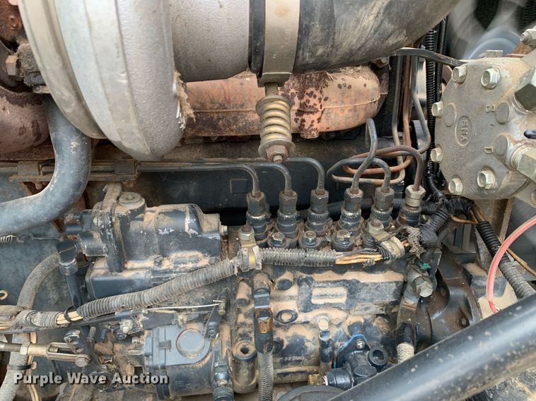 image for item DK7886 1998 Mack RD688S  cotton module transport truck