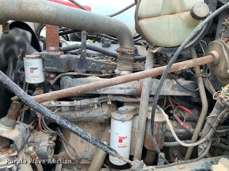 image for item DK7886 1998 Mack RD688S  cotton module transport truck