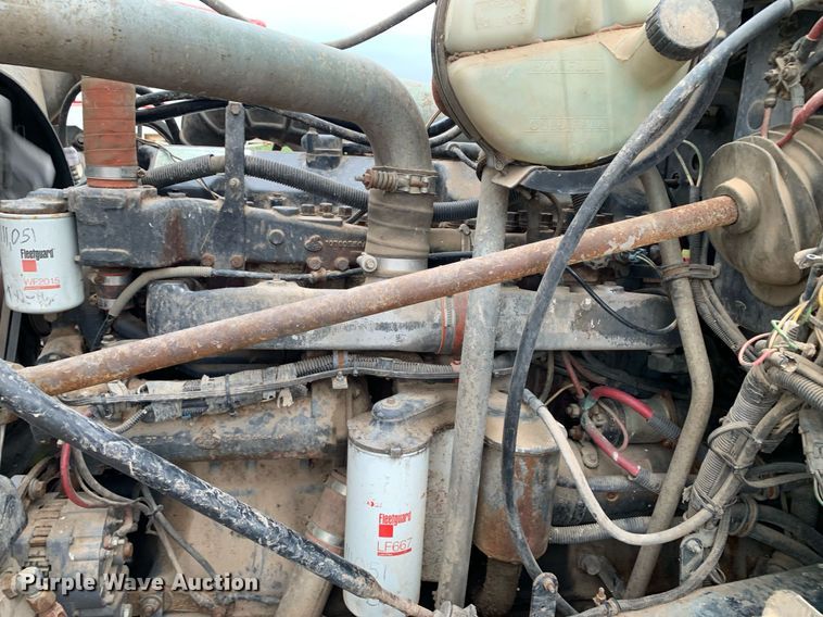 image for item DK7886 1998 Mack RD688S  cotton module transport truck