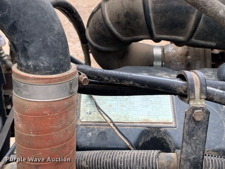 image for item DK7886 1998 Mack RD688S  cotton module transport truck