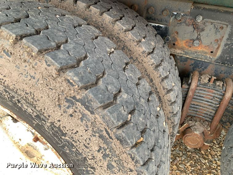 image for item DK7886 1998 Mack RD688S  cotton module transport truck