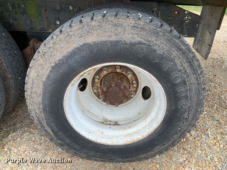 image for item DK7886 1998 Mack RD688S  cotton module transport truck