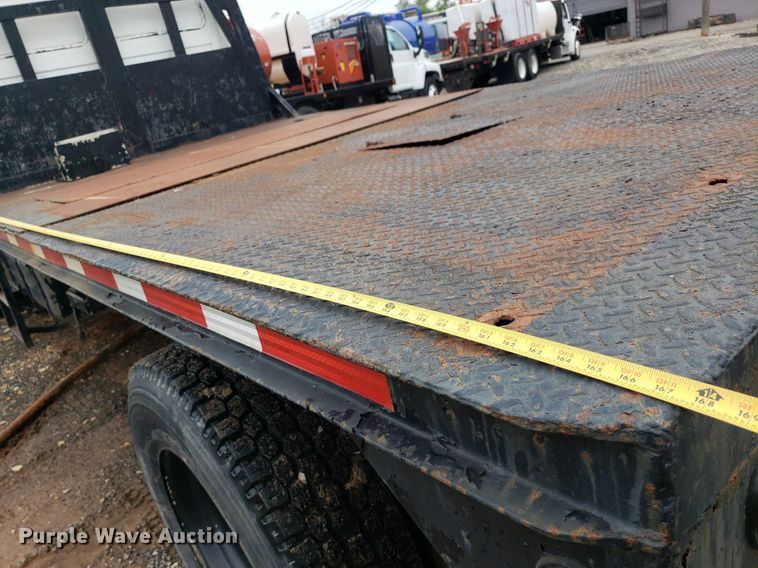 image for item DP7887 1999 Freightliner FL70  flatbed truck