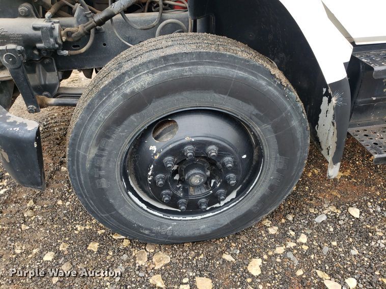 image for item DP7887 1999 Freightliner FL70  flatbed truck