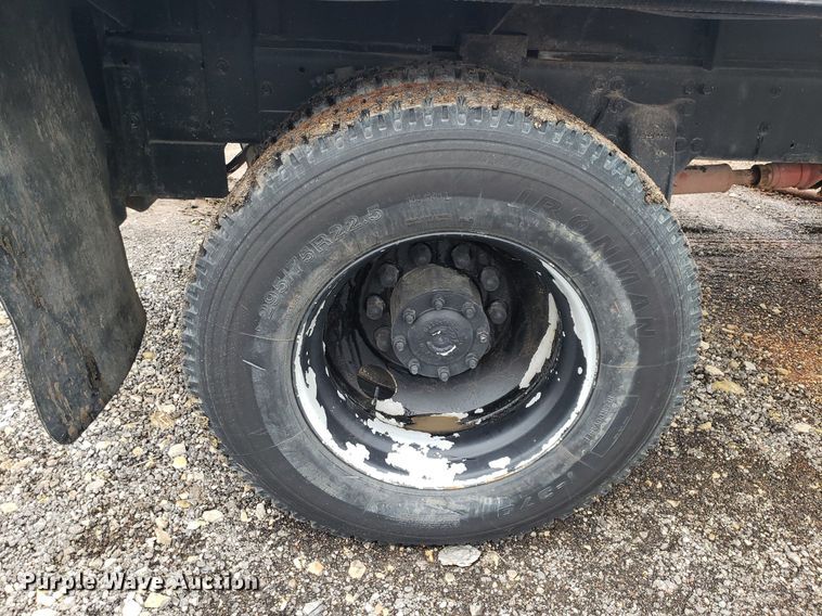 image for item DP7887 1999 Freightliner FL70  flatbed truck