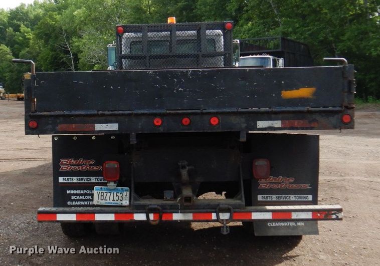 image for item AF9700 2003 Freightliner FL70  dump flatbed truck