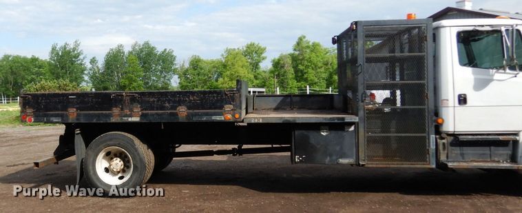 image for item AF9700 2003 Freightliner FL70  dump flatbed truck