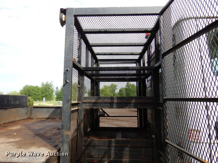 image for item AF9700 2003 Freightliner FL70  dump flatbed truck